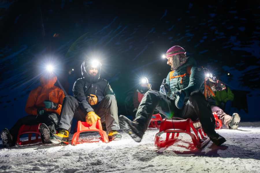 Outdoor Switzerland AG Nachtschlitteln mit Abendessen