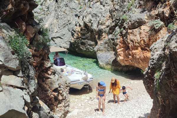 Full Day Private Boat to Grama Bay , Smugglers Canyon & Blue Cave