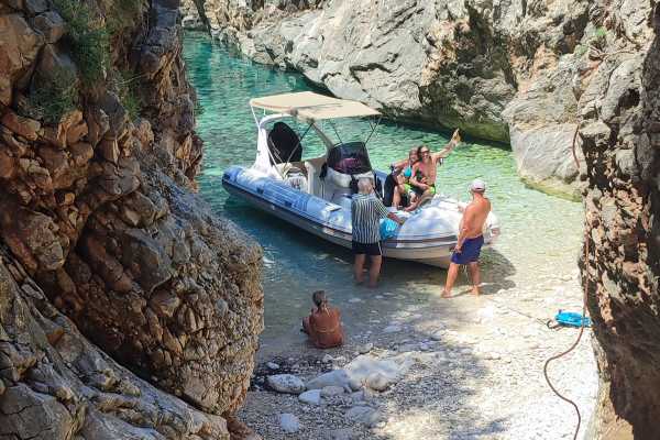Full Day Private Boat to Grama Bay , Smugglers Canyon & Blue Cave