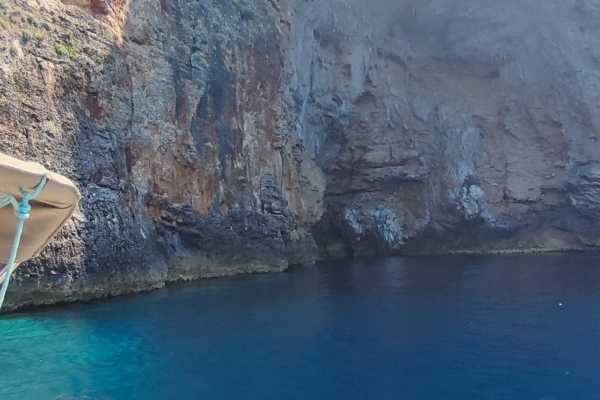 Full Day Private Boat to Grama Bay , Smugglers Canyon & Blue Cave