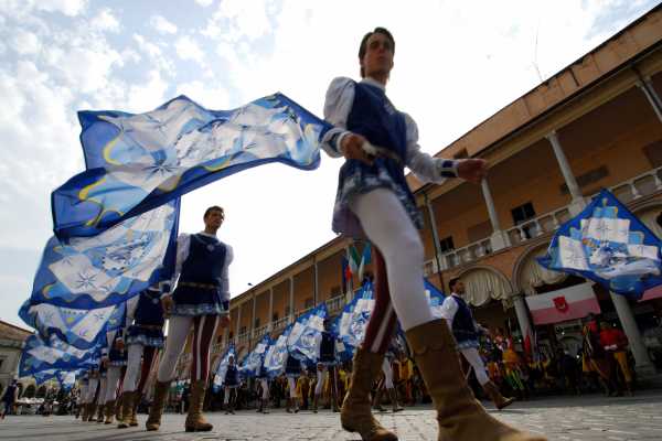 Medieval dinner in one districts the Palio del Niballo in Faenza for the Imola Camper Parade.