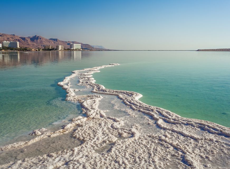 Salted Water in the Dead Sea with salt crystals-Jordan