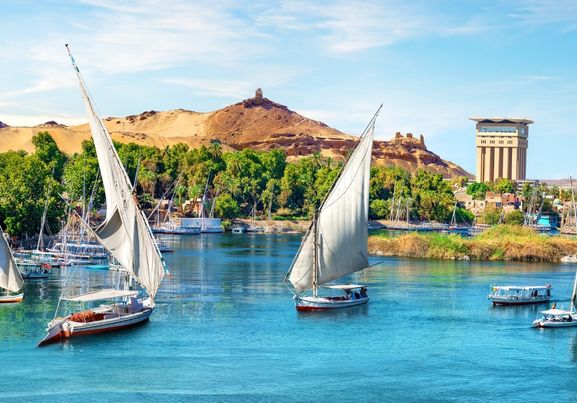 Aswan and Boats in a Blue Scenic River and sunny day
