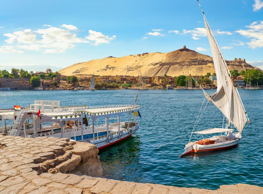 Sailboats in Nile River at Aswan with blue sky -egypt