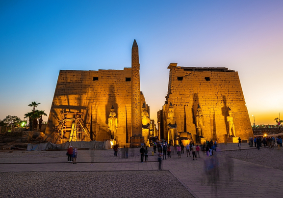 Pylon with obelisk in Luxor Temple, beautiful evening view, Egypt
