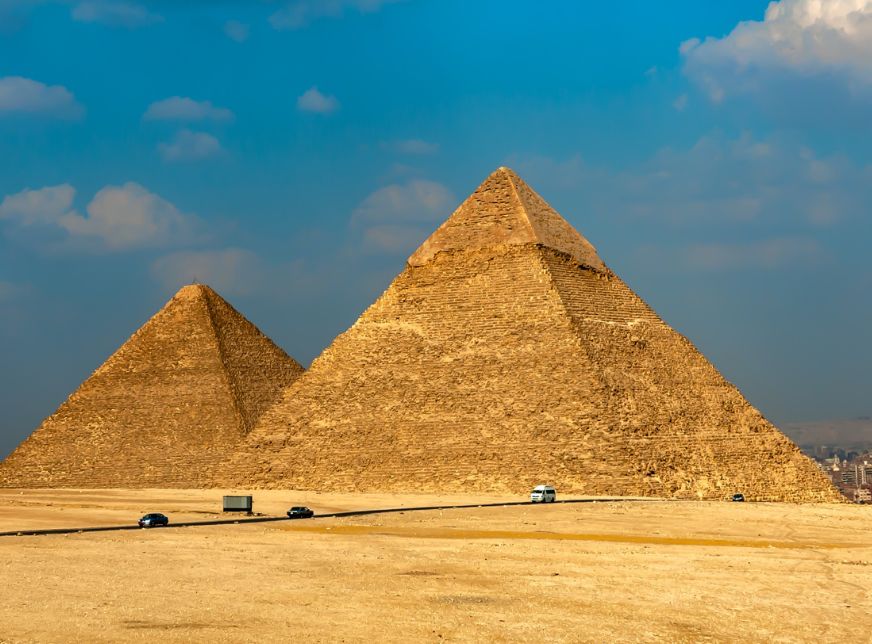 Panoramic view of the Pyramids of Giza and the desert landscape Egypt
