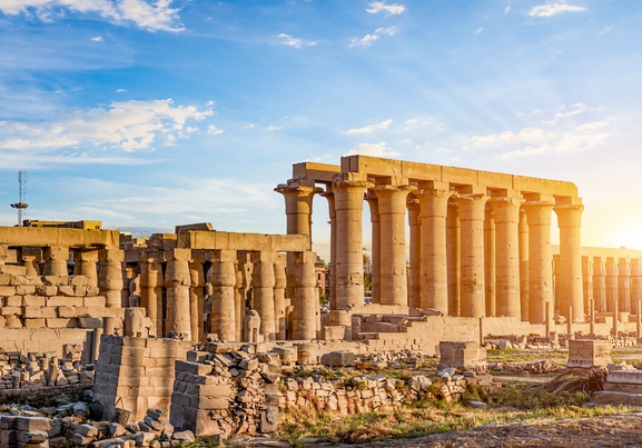Ruins of Karnak Temple and sun set at luxor egypt 