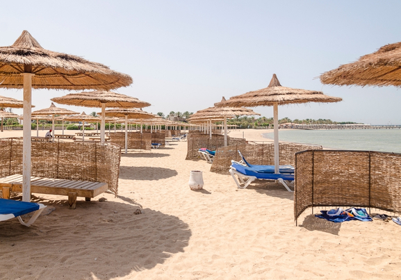 Beach umbrellas, beach and Red Sea at hurghda egypt