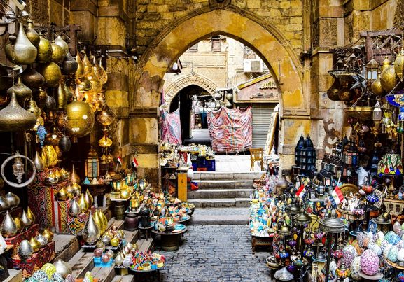 Stacked illuminated copper lanterns in Khan El Khalili bazaar Cairo Egypt